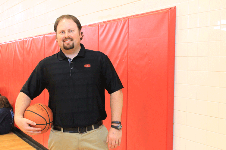 Coach Mark Austin is a 1996 graduate of Tunstall High School.