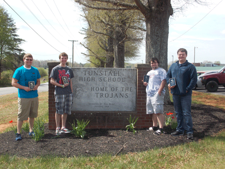 Seniors Landon Holley, Michael Compton, Dustin Meadows, and Jeremy Wyatt hold their FBLA awards. 