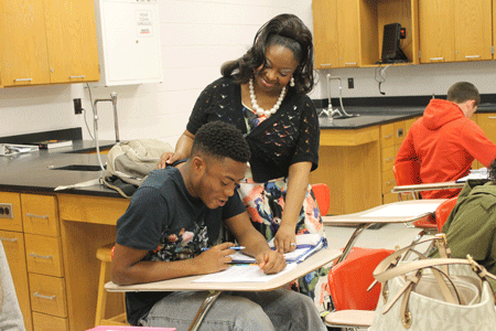 Even jocks need to learn chemistry, says Mrs. Lee. 