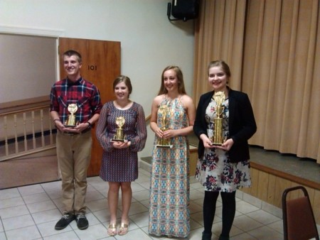 (left to right): Juniors Trey Dallas and Cassidy Bowles, and senior Kaitlyn Aaron receive their scholarship awards. 