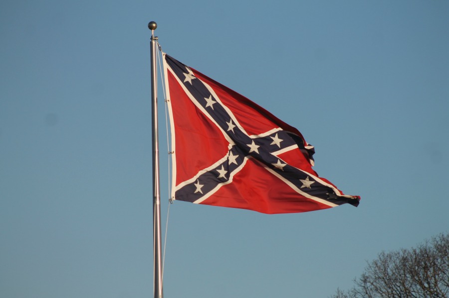 This is one of dozens of Confederate Flags that have recently been raised on private properties in the area. 