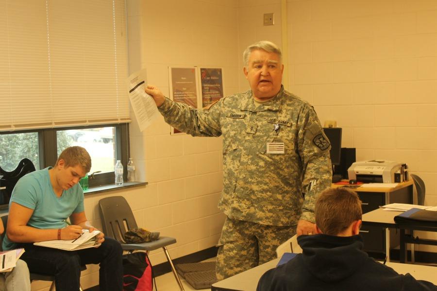 Junior Stefan Toney taking notes while Emerson prepares the class for the assessment 