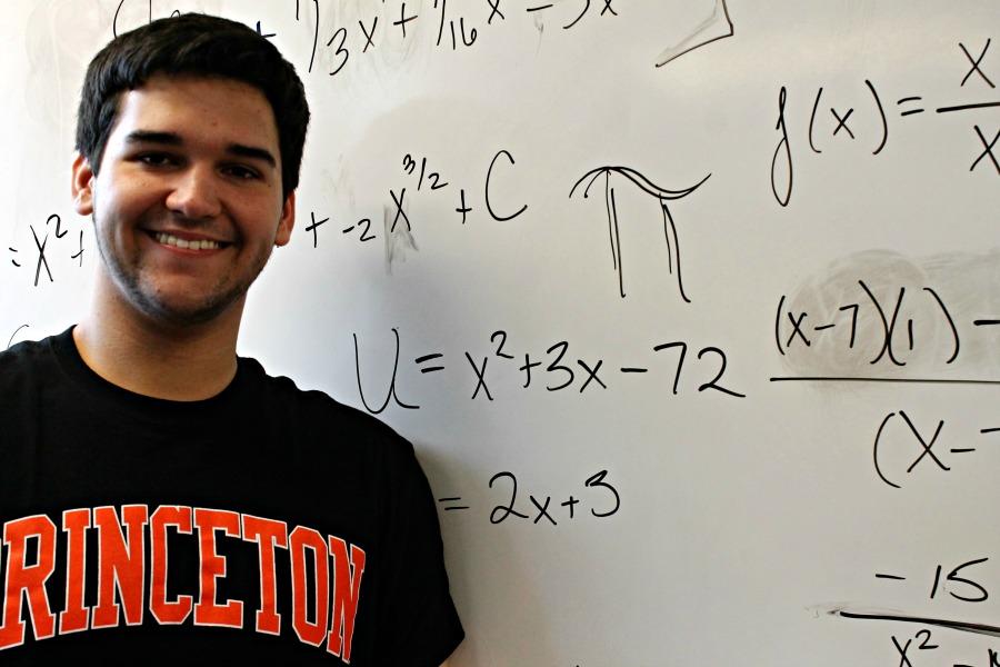 Senior Jarret Stowe proudly wears a Princeton University       t-shirt, where he will be attending in the fall.