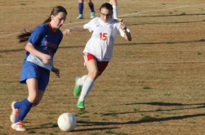 Sophomore Ali Hill chases after the ball and scored three games this match. 