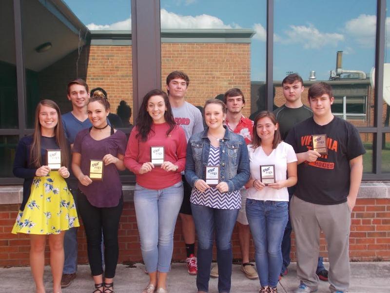 FBLA students pose with their plaques. 
Front row: Amber Murphy, Kasey Marshall, Kristin Hudson, Sarah Goard, Kayla McGuire, Joshua Drew Back row: Chandler Wilkins, Matt Yarbourgh, Kyle Davis, Dylan Haley.