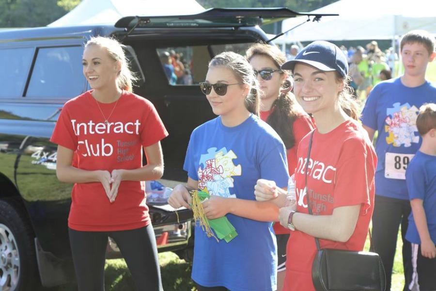 Juniors Madison Howell, Rebecca Jones, and Rebecca Mitchell oversee the first event 