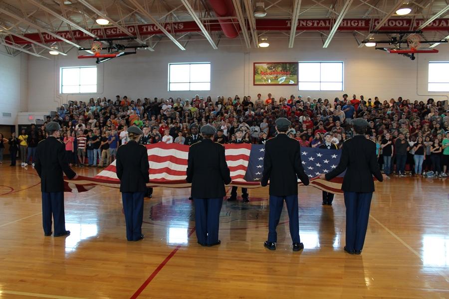 JROTC students present the flag for the pledge and national anthem. 