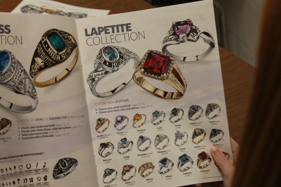 A student looks at the Lapetite collection on page 17 of the catalog.