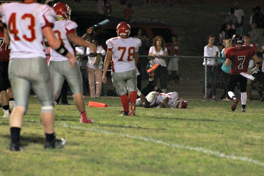 Running back Trevor Lovelace dives into the end zone for his fourth touchdown of the game