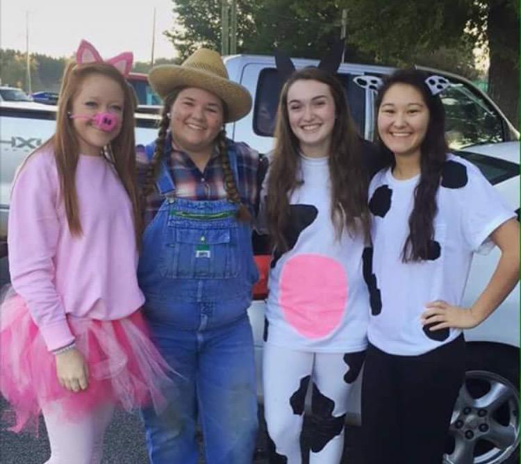 Destiney Duncan, Megan Saunders, Julianne Breedlove, and Destiny Fore meet up in the parking lot for a picture. 