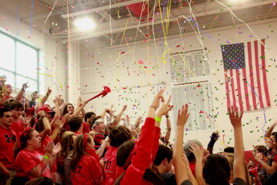 The senior class throwing confetti into the air while chanting THS! I love it, I love it, I love it!