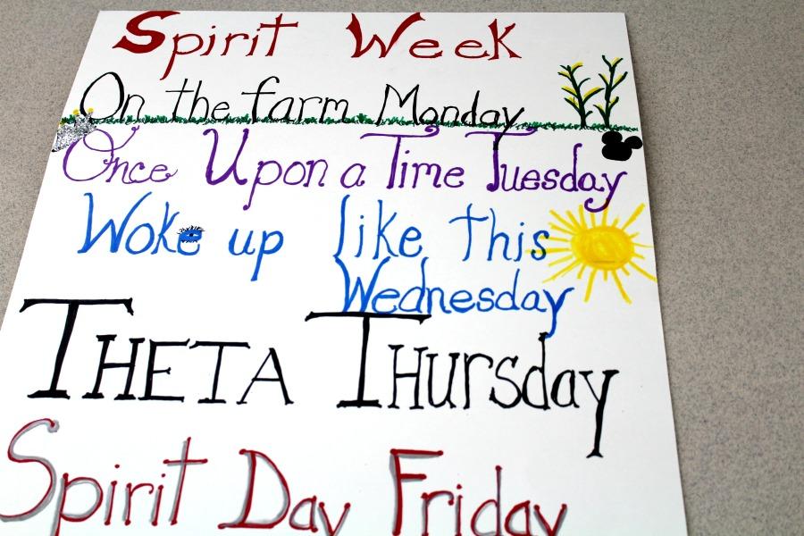 Spirit+Week+posters+made+by+the+varsity+cheerleaders+hang+throughout+the+halls+of+the+school.+