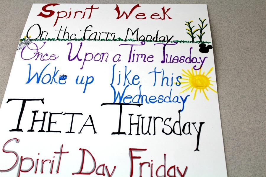 Spirit Week posters made by the varsity cheerleaders hang throughout the halls of the school. 