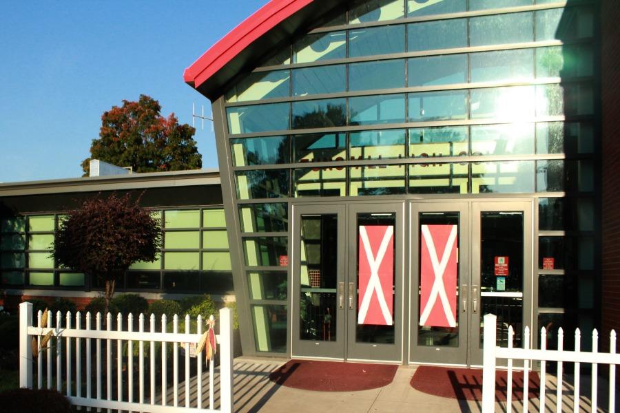 The outside of the school decorated as a barn.