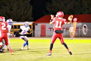 Buckner looks for an open receiver on the pass in Friday's 48-34 victory 