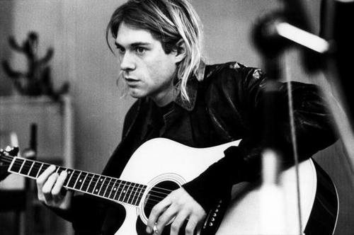 NETHERLANDS - NOVEMBER 25:  HILVERSUM  Photo of Kurt COBAIN and NIRVANA, Kurt Cobain recording in Hilversum Studios, playing Takamine acoustic guitar  (Photo by Michel Linssen/Redferns)