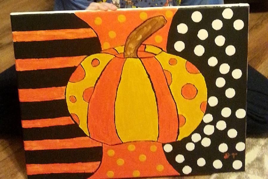 This pumpkin painting of hers uses the technique of balancing different patterns with one another. 