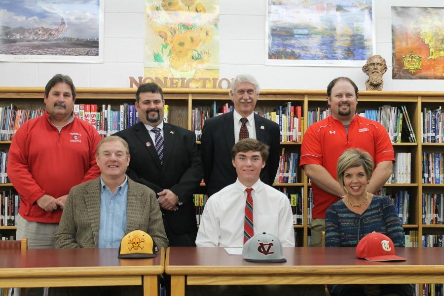 Back row, from left to right: head coach Barry Shelton, principal Brian Boles, assistant principal and athletic director Ed Newnam, and assistant coach Mark Austin 
Bottom row, left to right: Matts father, Matt Yarbrough, and Matts mother