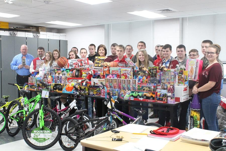 The JROTC cadets of THS stand in front of just some of the toys they proudly raised. 