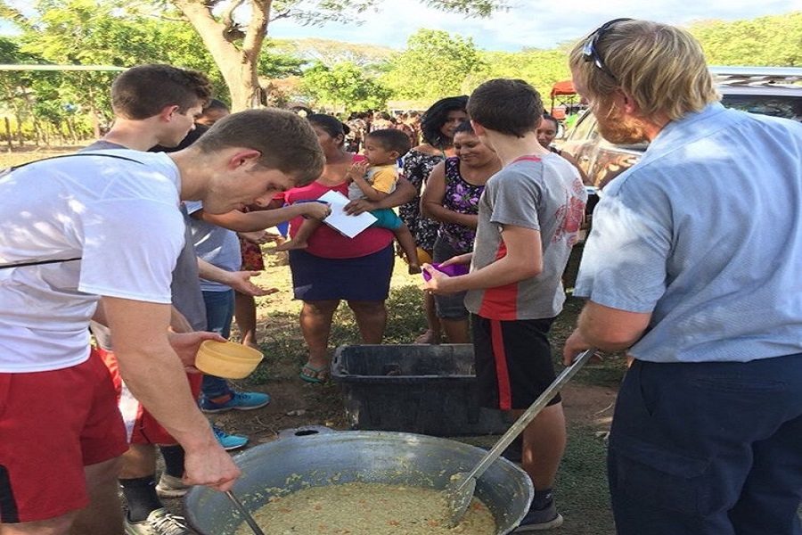 Jaydon prepares food for Nicaragua villagers on the first day of his mission trip. 