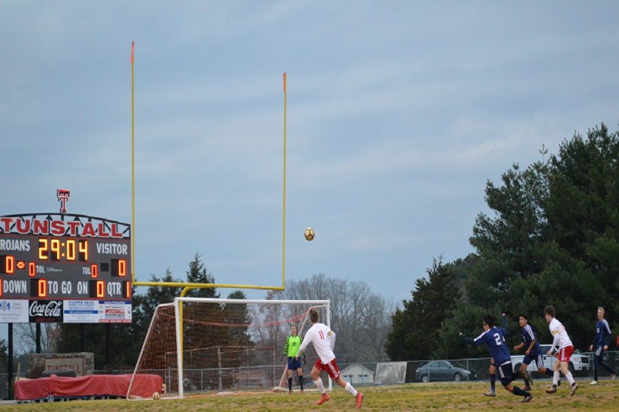 Senior Adam Scearcy watches the ball after making a shot to the goal. 