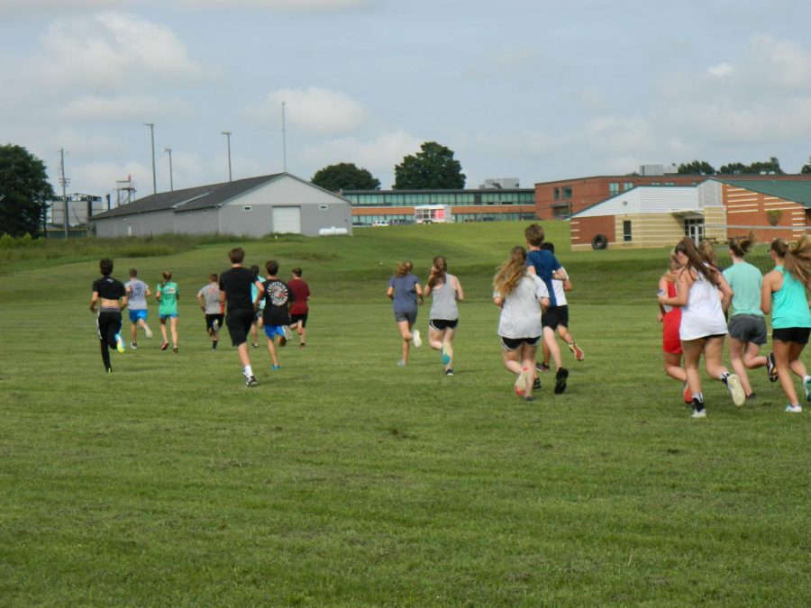 cross country runners practice for their first meet 