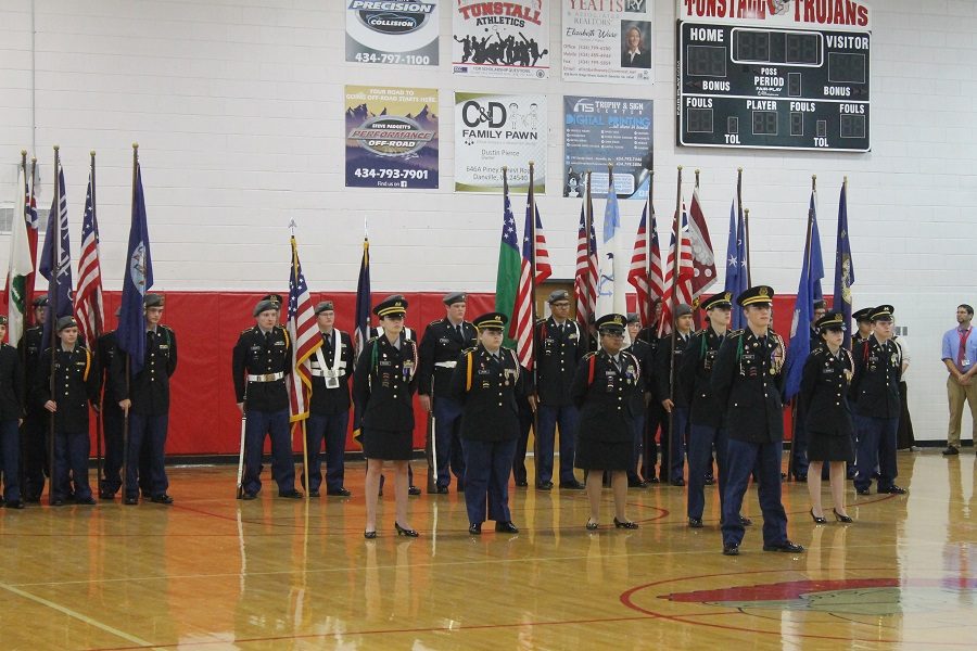 JROTC students stand in formation. 