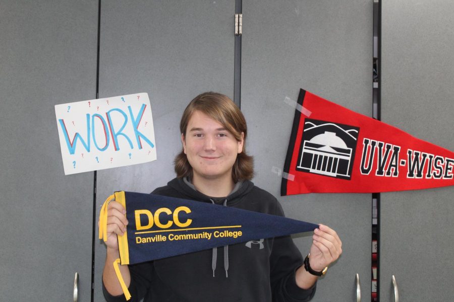 Junior Colby Ringstaff holding a DCC pennant