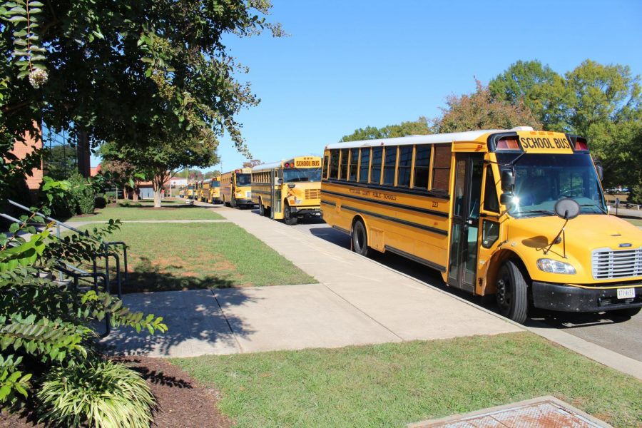 School buses line up outside of the school in preparation for dismissal.