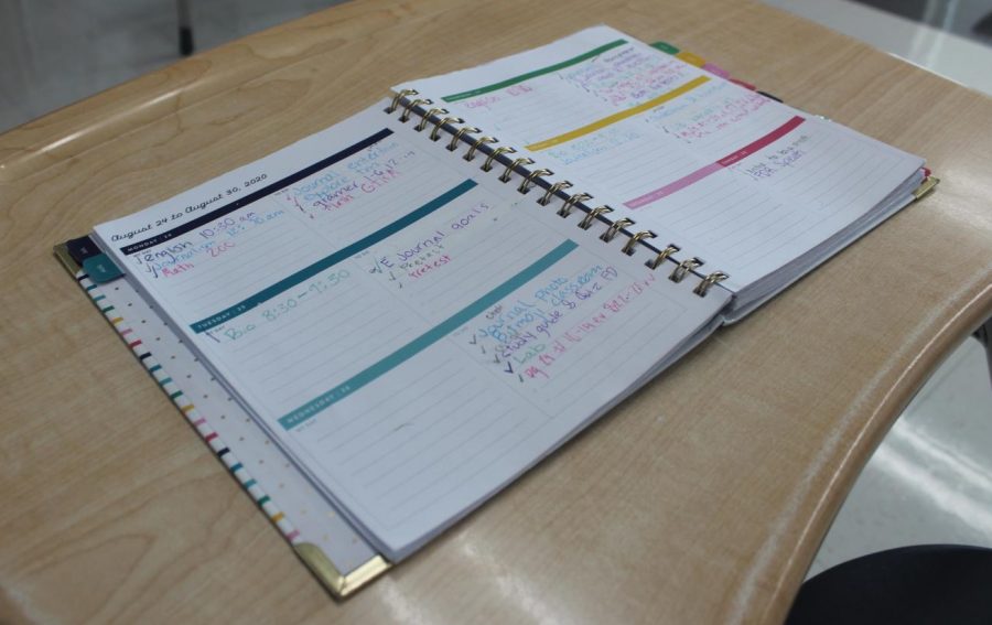 Addyson Hunsicker uses her planner to keep up with class times, work, and due dates. 