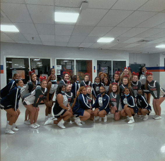 Tunstall and GW cheer teams unite during halftime performance