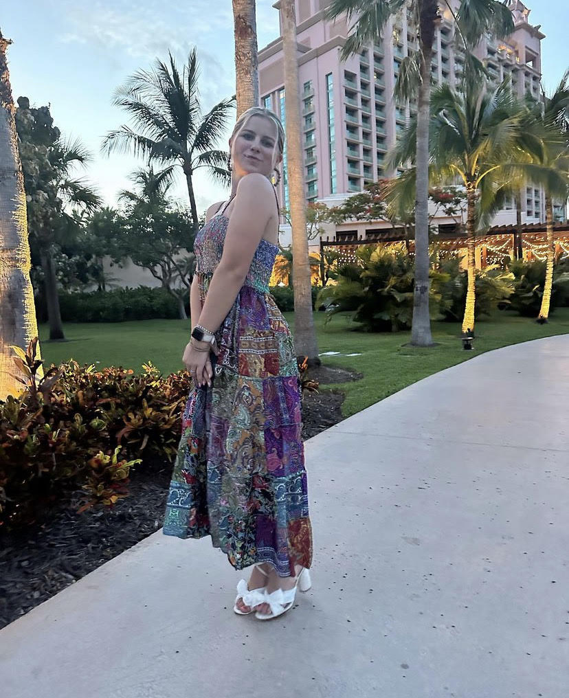 Grace Wann taking pictures in the Bahamas.