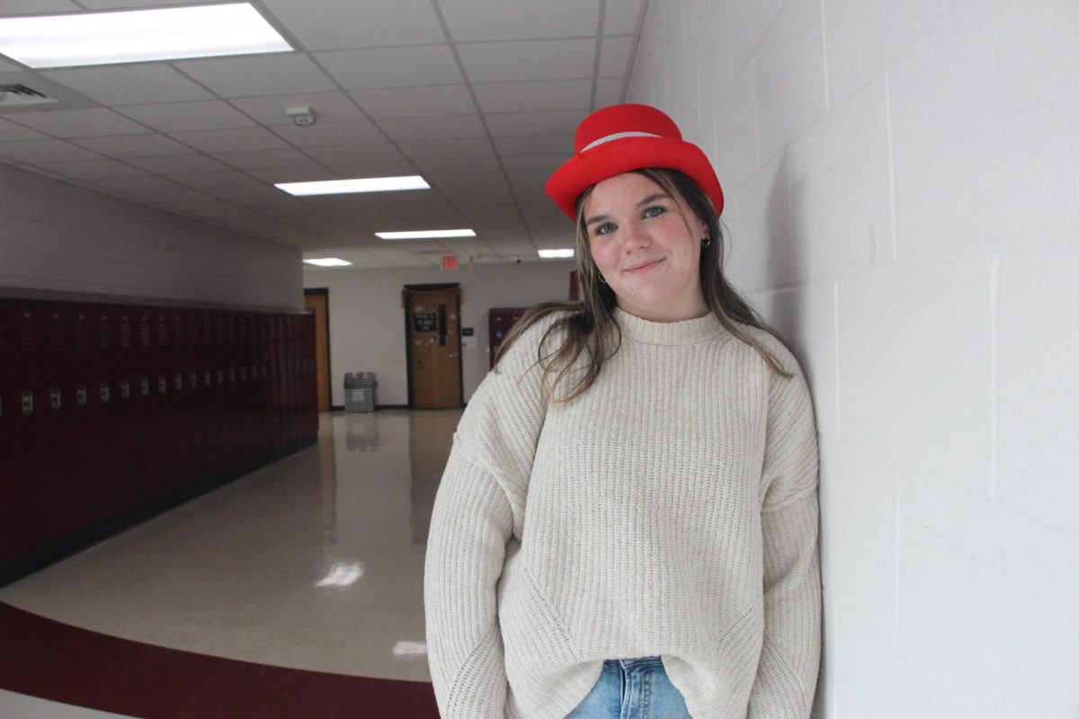 Sophomore Carleigh Setliff poses with a Christmas hat.