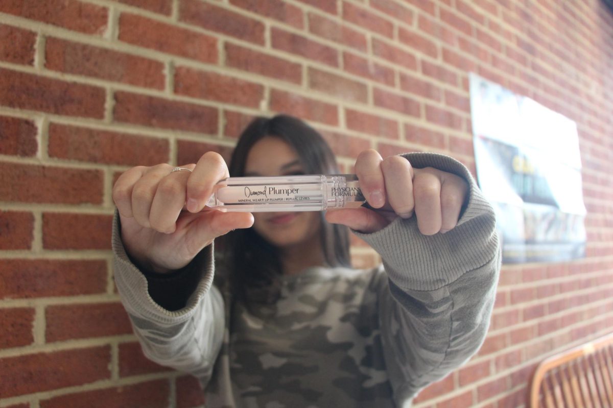 Sophomore Mccall Hollie poses with her favorite plumping lip gloss.