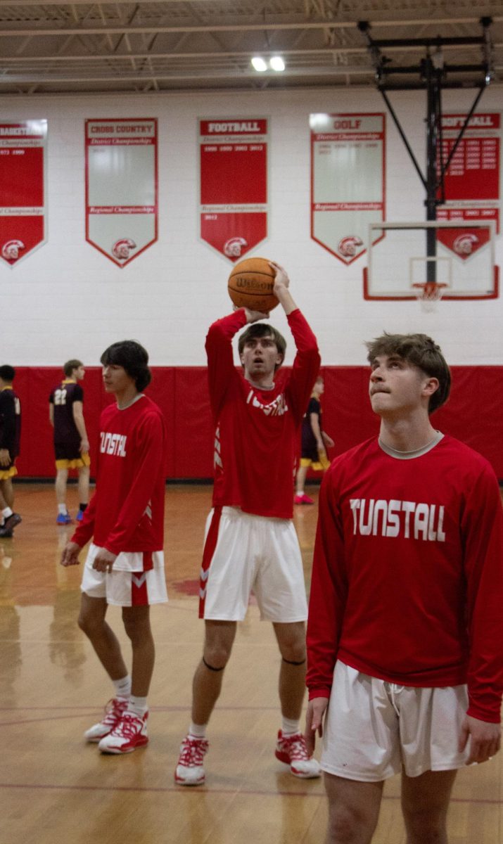 Senior Ian Yeatts warming up before defeating the Brookville Bees