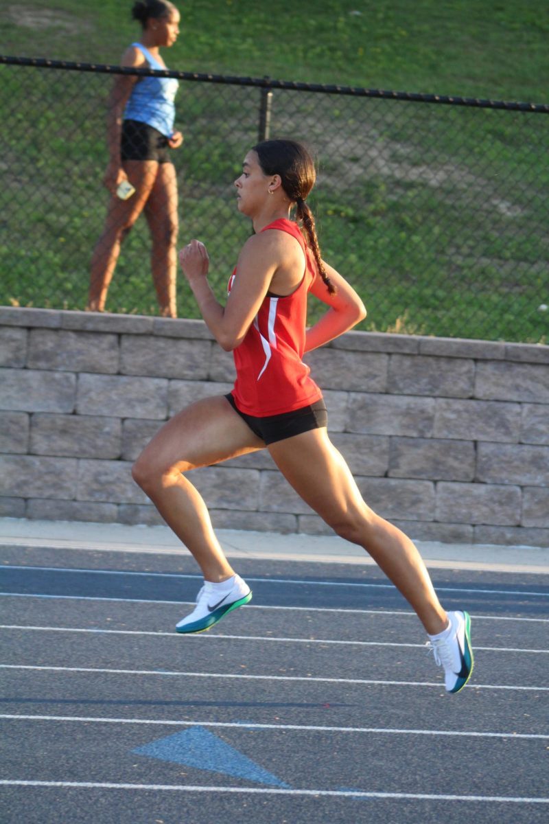 Summer Flores running the 400-meter dash. 